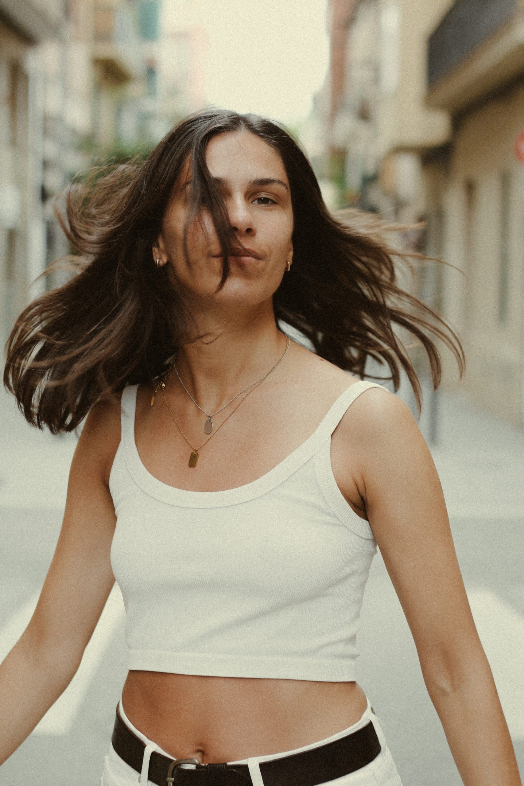 model shoot portrait woman white tshirt barcelona moving