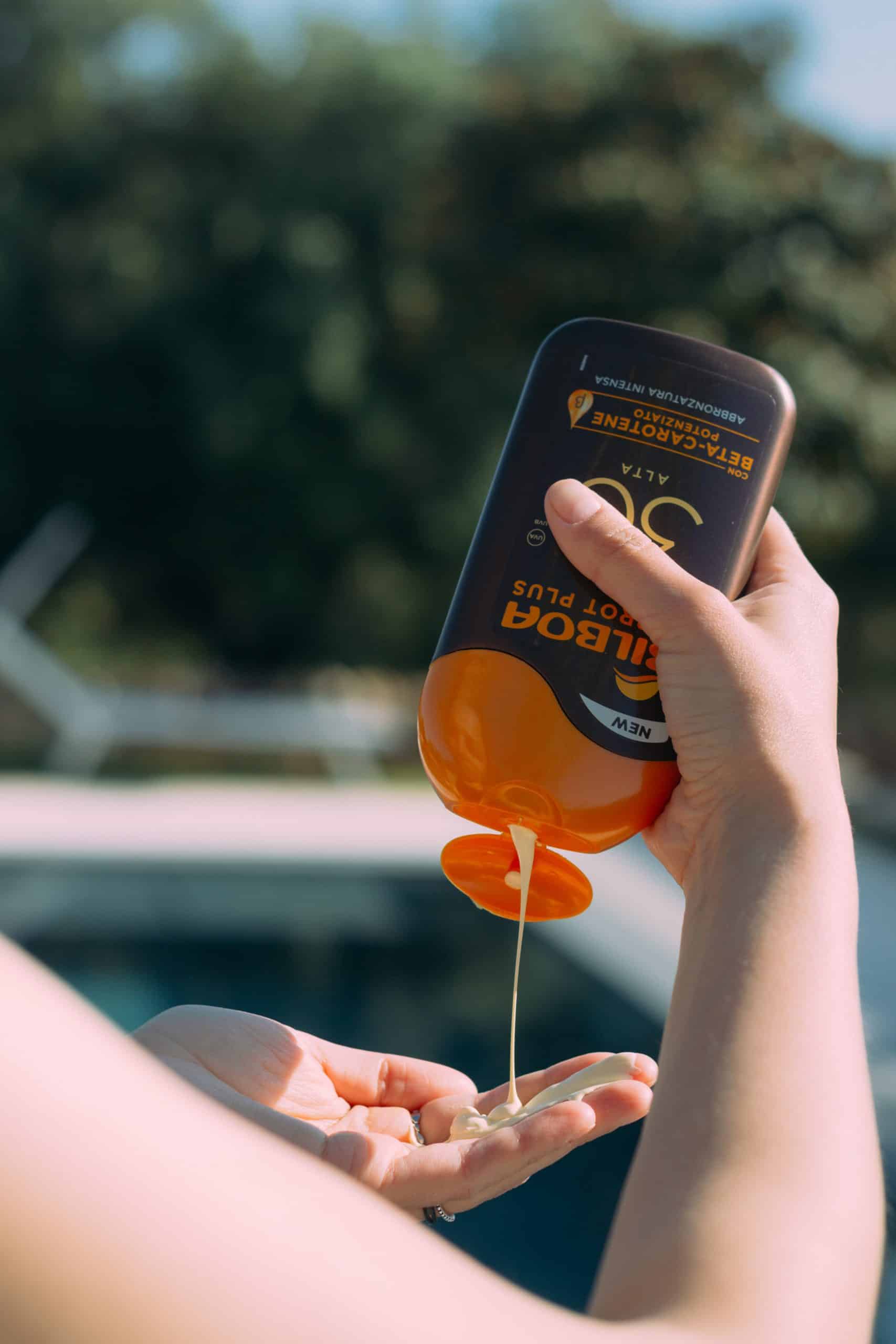 sun cream product shoot lifestyle with model